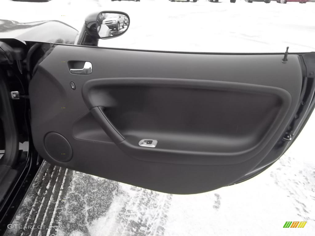 2009 Pontiac Solstice Roadster Ebony Door Panel Photo #43989104