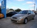 2001 Jackpot Gold Metallic Ford Focus SE Sedan  photo #4