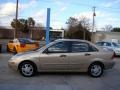 2001 Jackpot Gold Metallic Ford Focus SE Sedan  photo #5