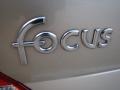 2001 Jackpot Gold Metallic Ford Focus SE Sedan  photo #33