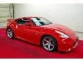 2009 Solid Red Nissan 370Z NISMO Coupe  photo #1
