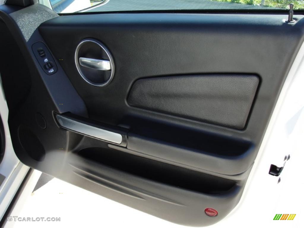 2008 Pontiac Grand Prix GXP Sedan Ebony Door Panel Photo #44079450