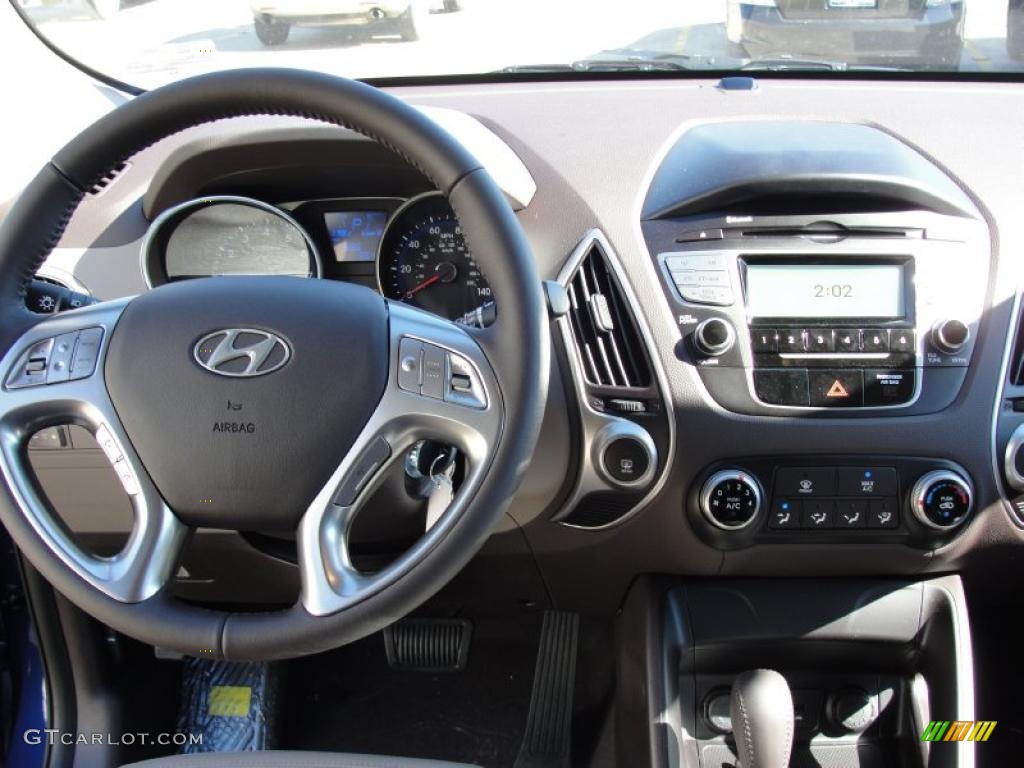 2011 Hyundai Tucson GLS Taupe Dashboard Photo #44110466