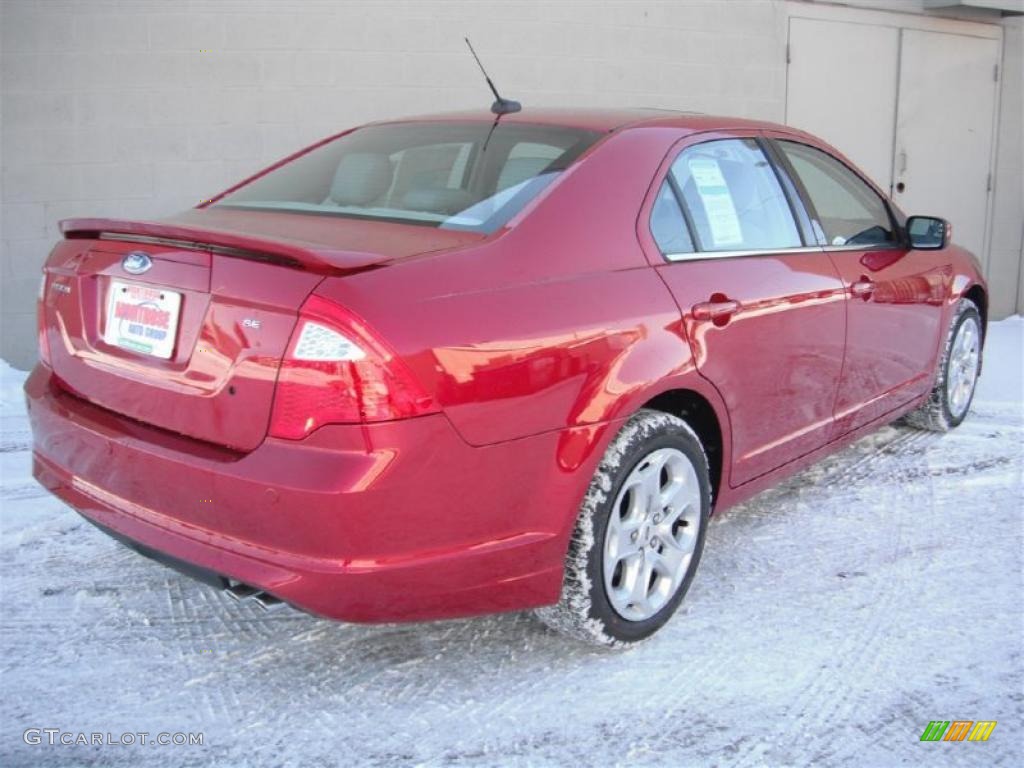 2011 Fusion SE - Red Candy Metallic / Charcoal Black photo #6