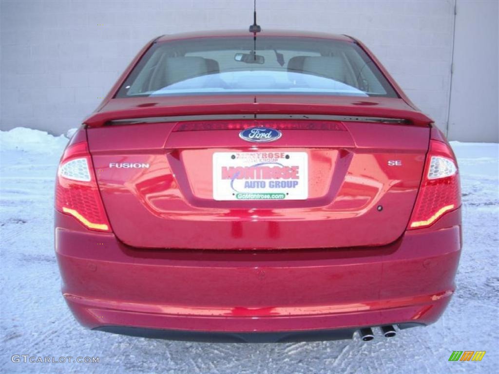 2011 Fusion SE - Red Candy Metallic / Charcoal Black photo #8
