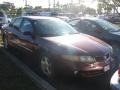 Maple Red Metallic 2002 Pontiac Bonneville SE