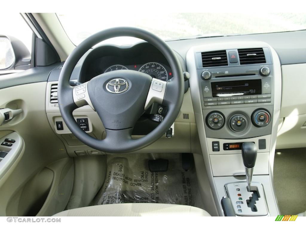 2011 Toyota Corolla LE Bisque Dashboard Photo #44221858