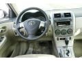 Bisque 2011 Toyota Corolla LE Dashboard