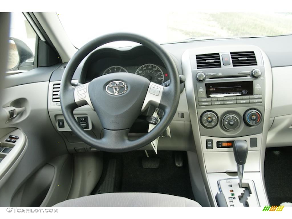 2011 Toyota Corolla LE Ash Dashboard Photo #44223725