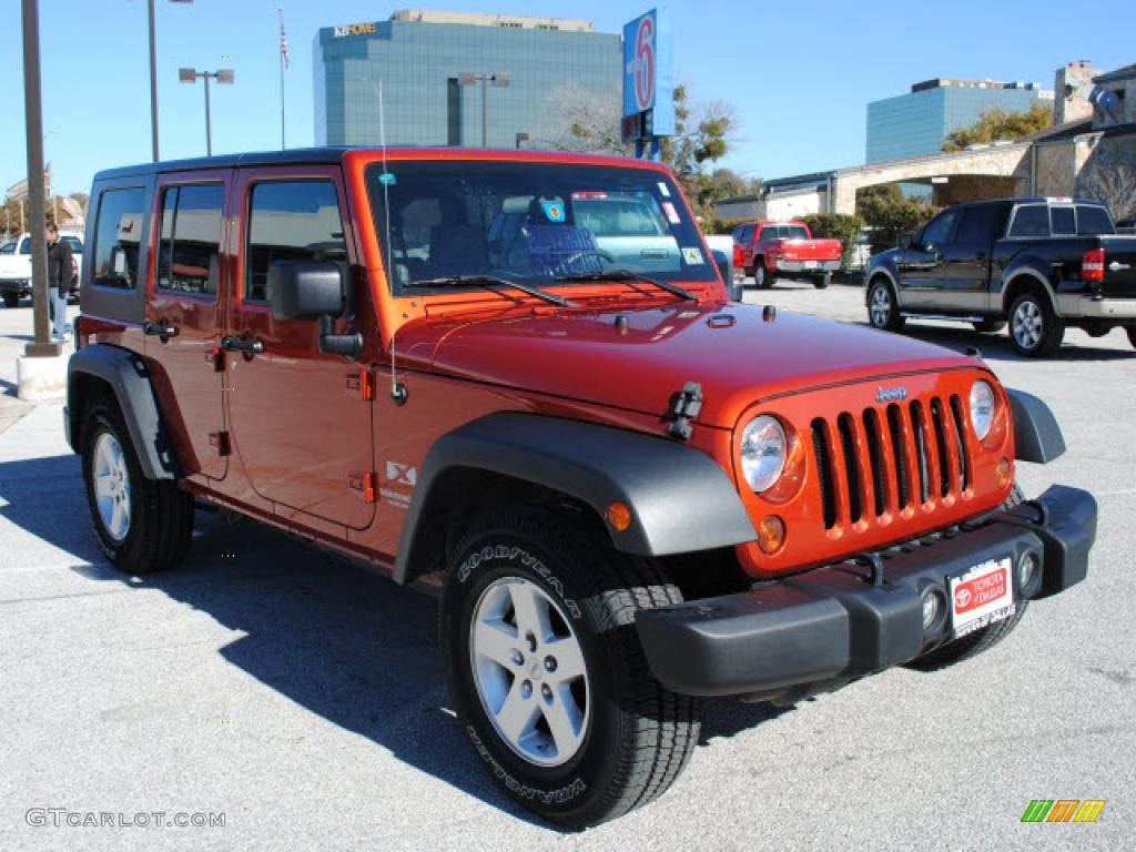 Sunburst Orange Pearl 2009 Jeep Wrangler Unlimited X Exterior Photo #44396318
