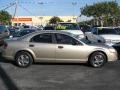 Light Almond Pearl Metallic - Stratus SE Sedan Photo No. 11