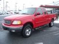 Bright Red 1999 Ford F150 XLT Extended Cab 4x4