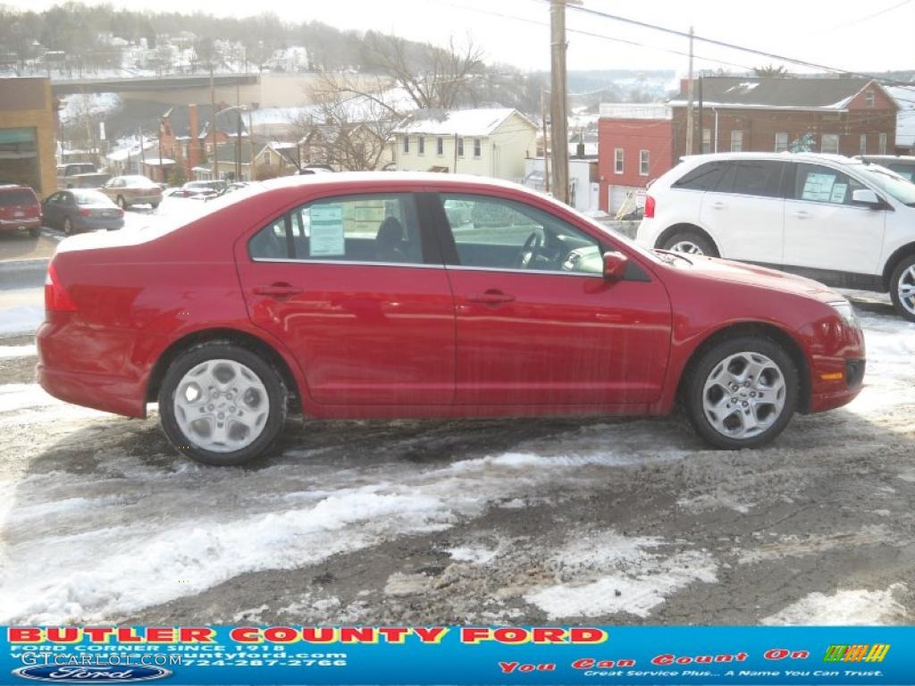 2011 Fusion SE - Red Candy Metallic / Charcoal Black photo #2