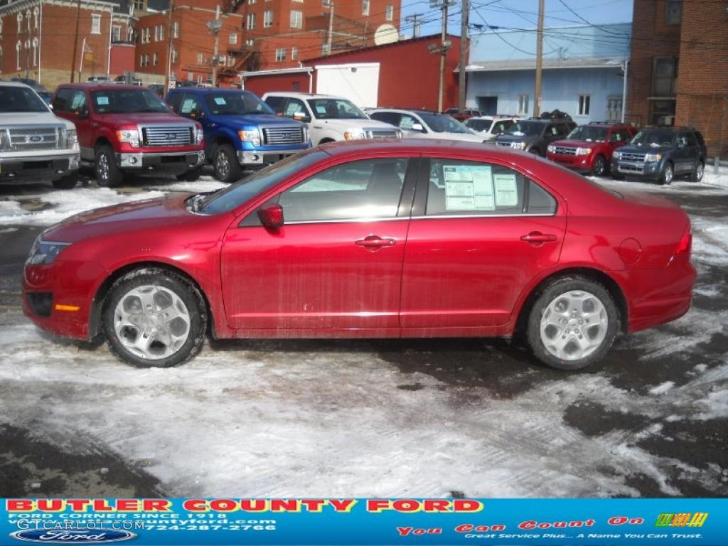 2011 Fusion SE - Red Candy Metallic / Charcoal Black photo #6