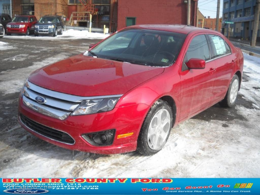 2011 Fusion SE - Red Candy Metallic / Charcoal Black photo #19