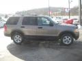 2003 Harvest Gold Metallic Ford Explorer XLT 4x4  photo #3