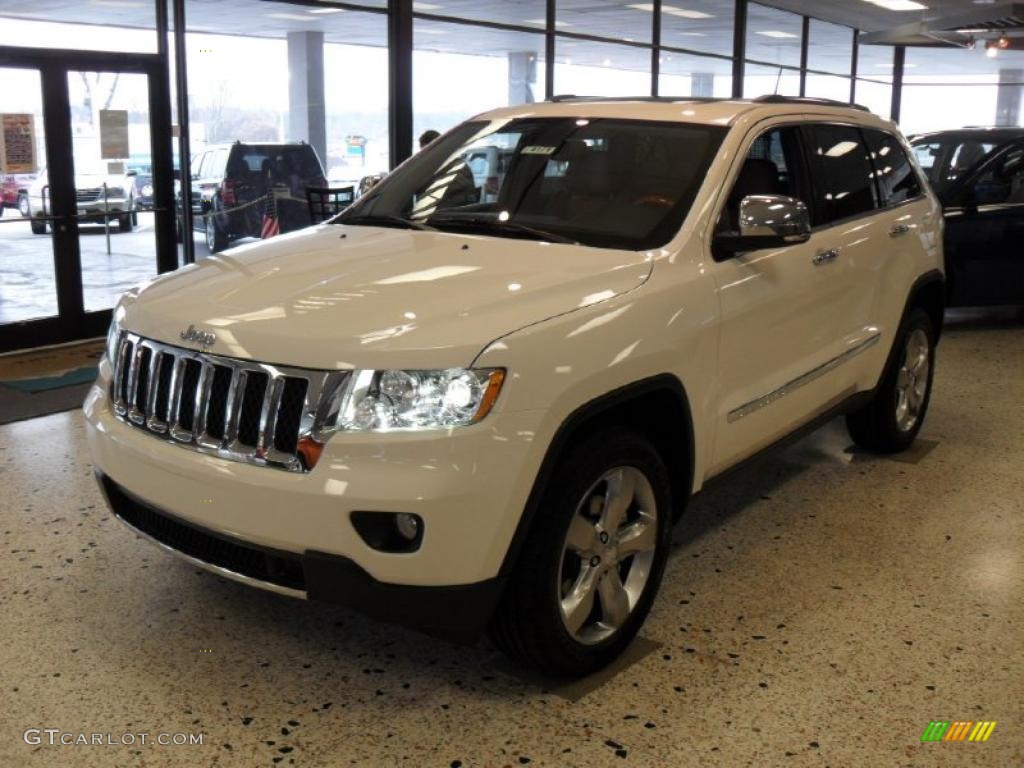 2011 Grand Cherokee Overland - Stone White / New Saddle/Black photo #1