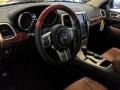 New Saddle/Black Prime Interior Photo for 2011 Jeep Grand Cherokee #44570433
