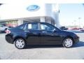 2011 Ebony Black Ford Focus SEL Sedan  photo #2