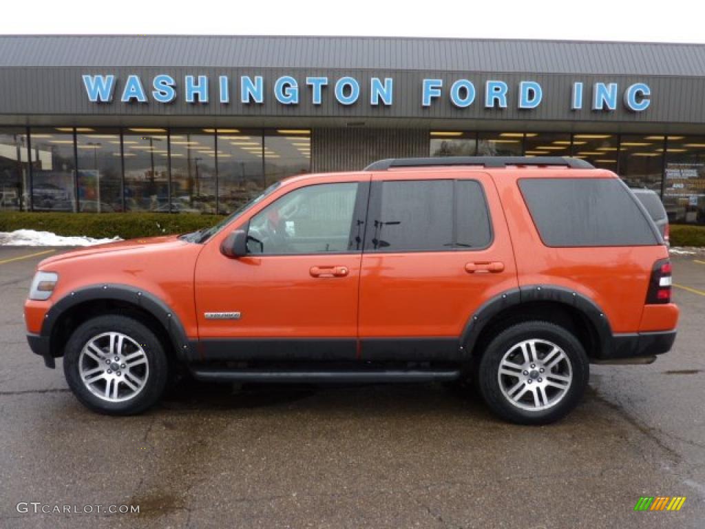 2007 Explorer XLT Ironman Edition 4x4 - Orange Frost Metallic / Black/Stone photo #1