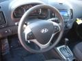 Black Steering Wheel Photo for 2011 Hyundai Elantra #44612186