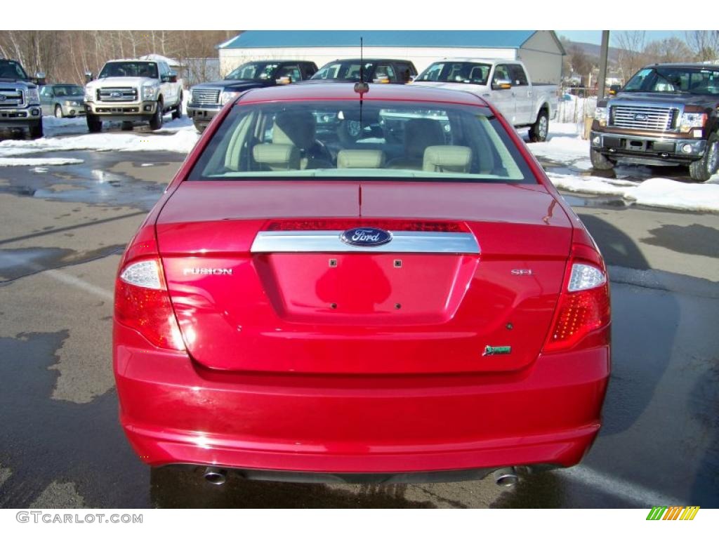 2010 Fusion SEL V6 - Red Candy Metallic / Camel photo #6