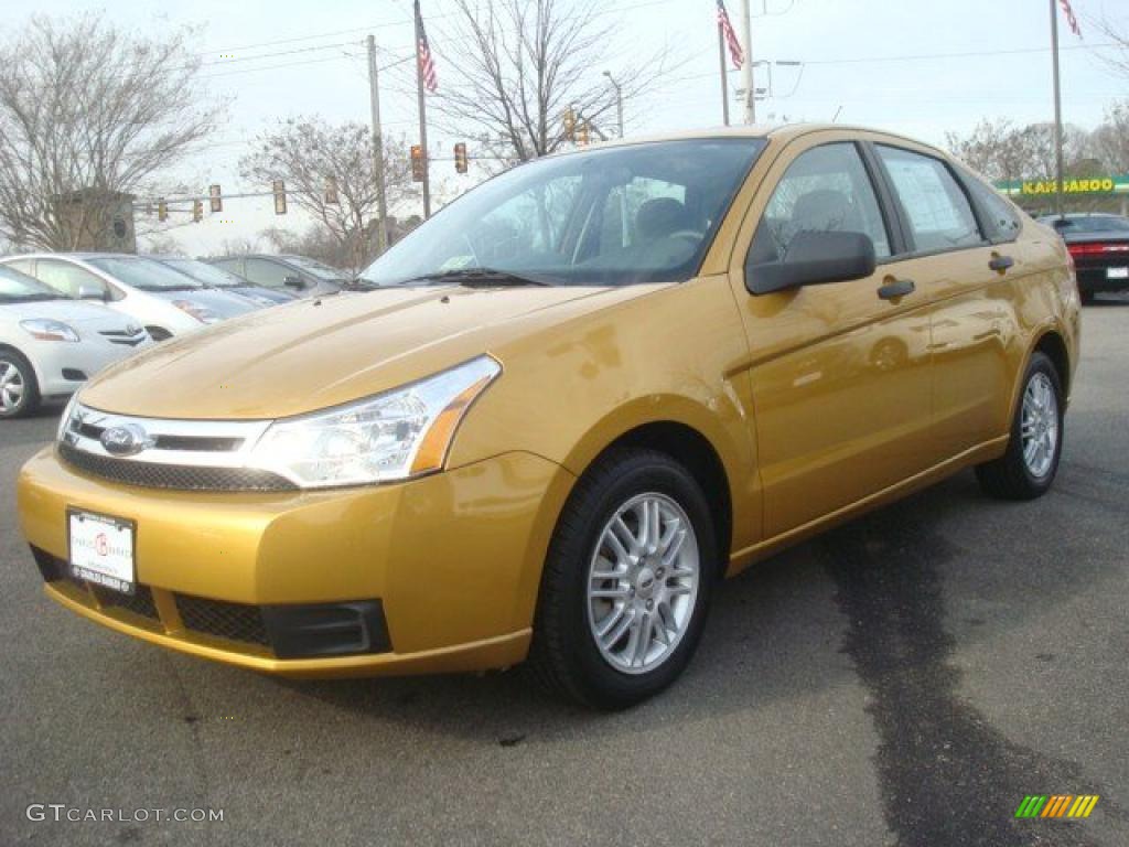 Amber Gold Metallic 2009 Ford Focus SE Sedan Exterior Photo #44660367