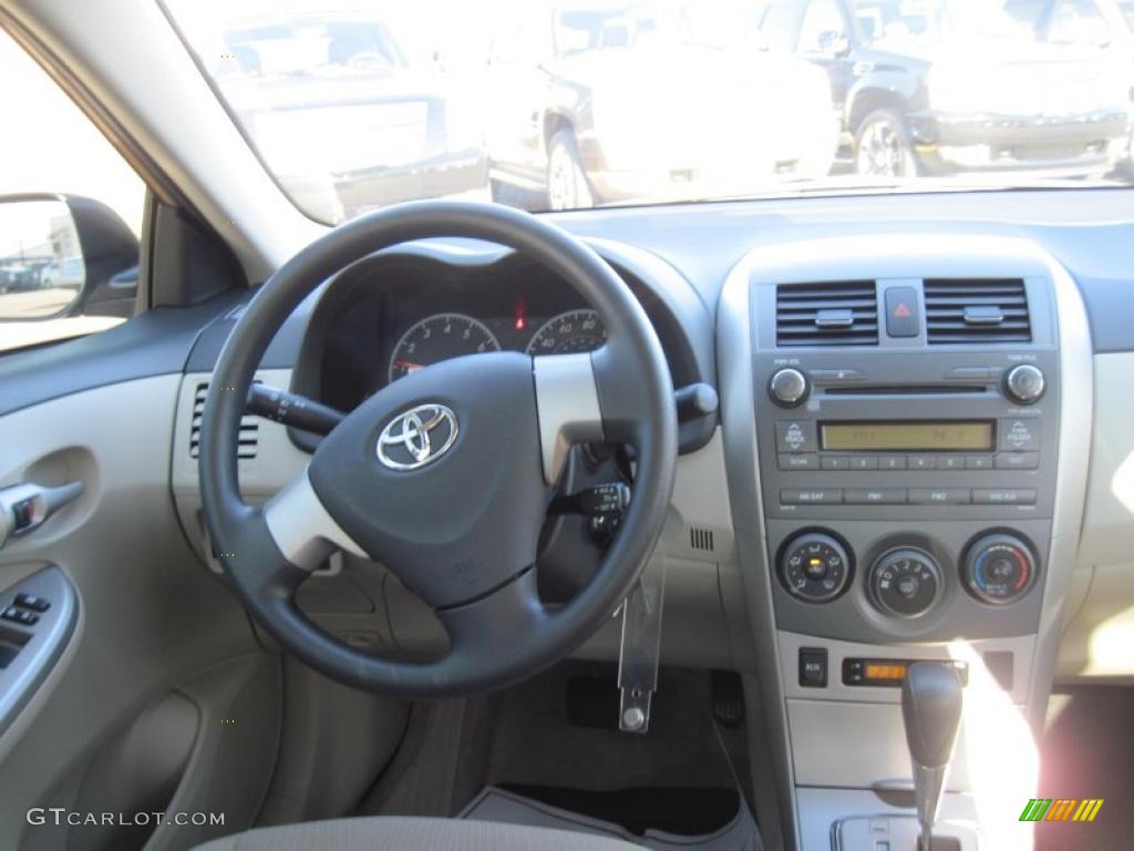2011 Toyota Corolla LE Bisque Dashboard Photo #44691417