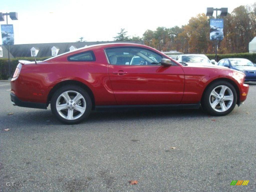 2010 Mustang V6 Premium Coupe - Red Candy Metallic / Stone photo #7