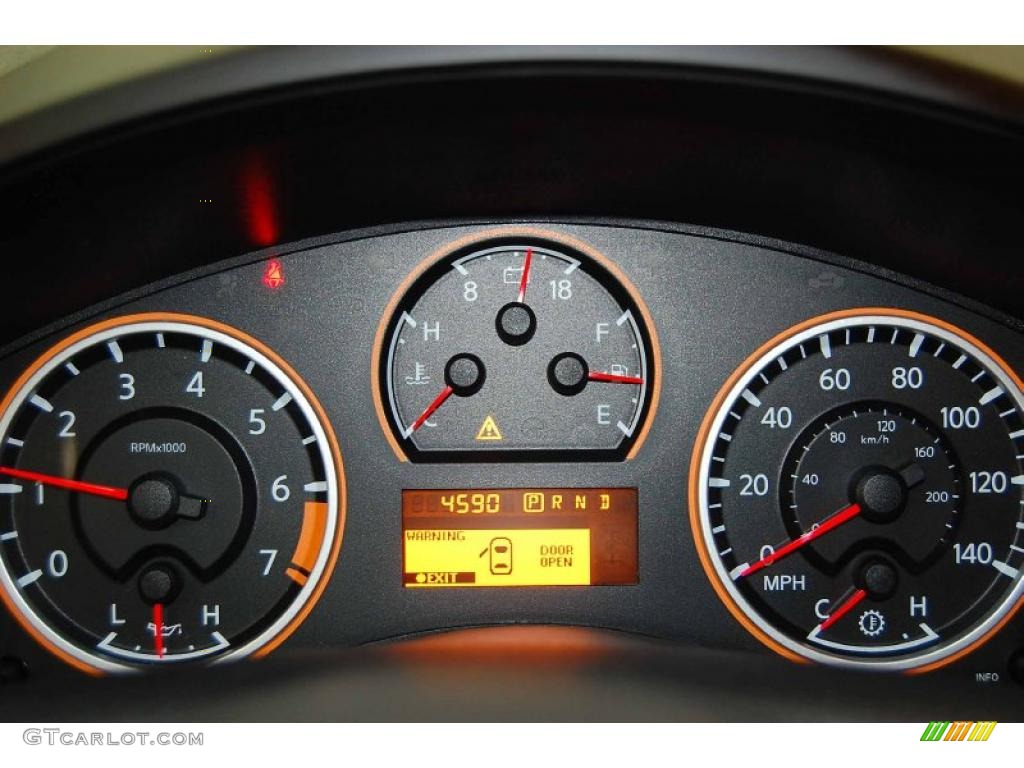 2010 Nissan Titan SE King Cab Gauges Photo #44696445