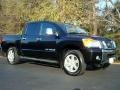 2010 Galaxy Black Nissan Titan LE Crew Cab 4x4  photo #1