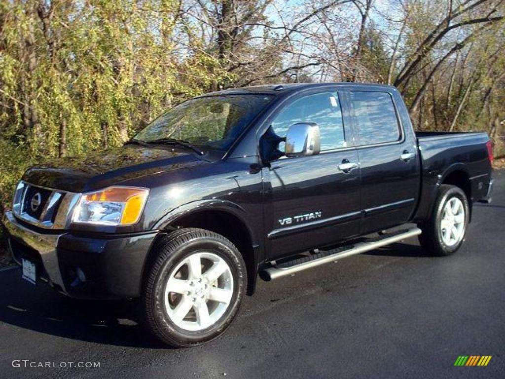 Galaxy Black 2010 Nissan Titan LE Crew Cab 4x4 Exterior Photo #44704413