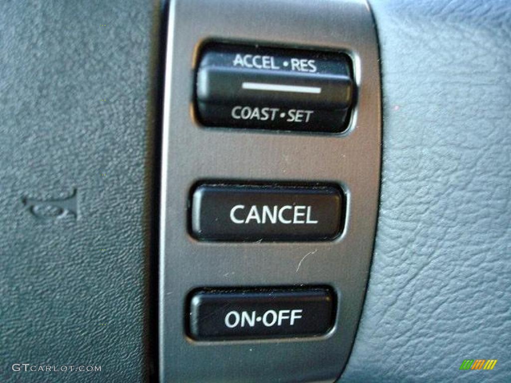 2010 Nissan Titan LE Crew Cab 4x4 Controls Photo #44704678