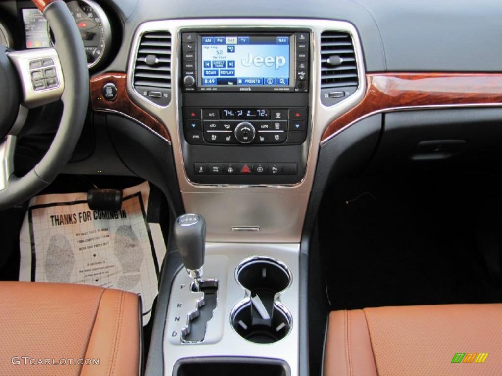 2011 Jeep Grand Cherokee Overland New Saddle/Black Dashboard Photo #44711119