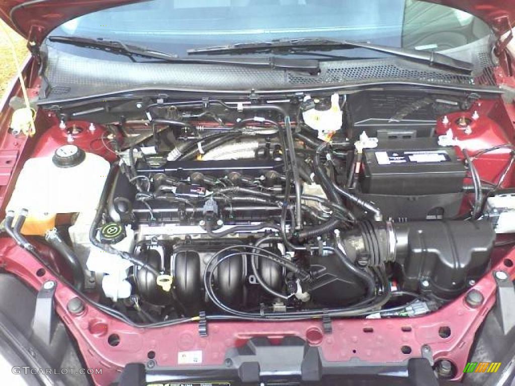 2006 Focus ZX5 SE Hatchback - Dark Toreador Red Metallic / Charcoal/Charcoal photo #19