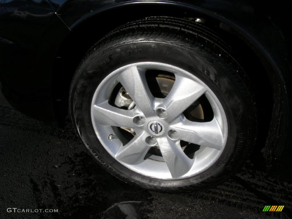 2011 Nissan Versa 1.8 SL Hatchback Wheel Photo #44799562