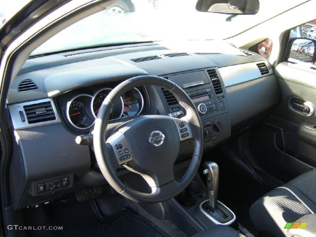 2011 Nissan Versa 1.8 SL Hatchback Charcoal Dashboard Photo #44799614