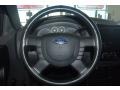 2005 Ford Ranger Ebony Black/Blue Interior Steering Wheel Photo