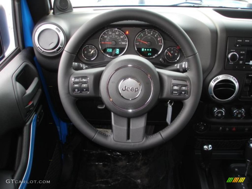 2011 Jeep Wrangler Unlimited Sahara 4x4 Black Steering Wheel Photo #44823704