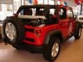 2011 Flame Red Jeep Wrangler Unlimited Sport 4x4  photo #10