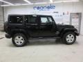 2011 Black Jeep Wrangler Unlimited Sahara 4x4  photo #4