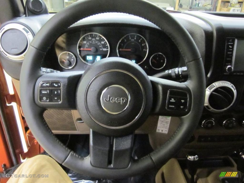 2011 Jeep Wrangler Unlimited Sahara 4x4 Black/Dark Saddle Steering Wheel Photo #44892609