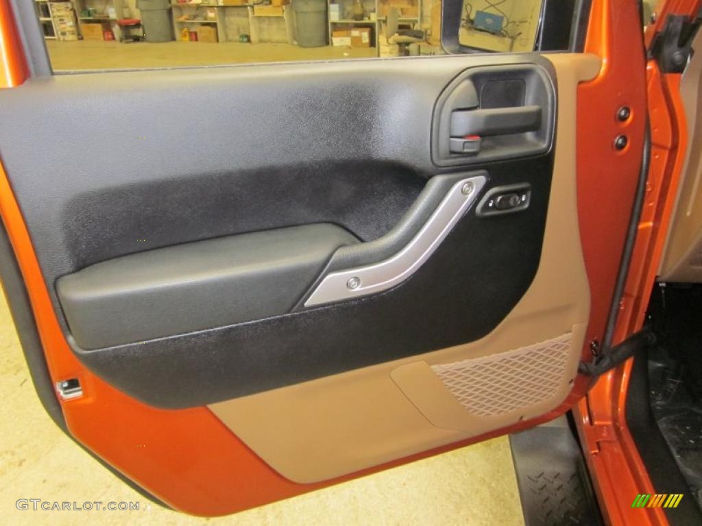 2011 Jeep Wrangler Unlimited Sahara 4x4 Black/Dark Saddle Door Panel Photo #44892693