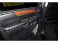 2010 Nissan Armada Charcoal Interior Door Panel Photo