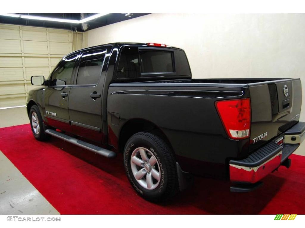 Galaxy Black 2010 Nissan Titan SE Crew Cab Exterior Photo #44910639