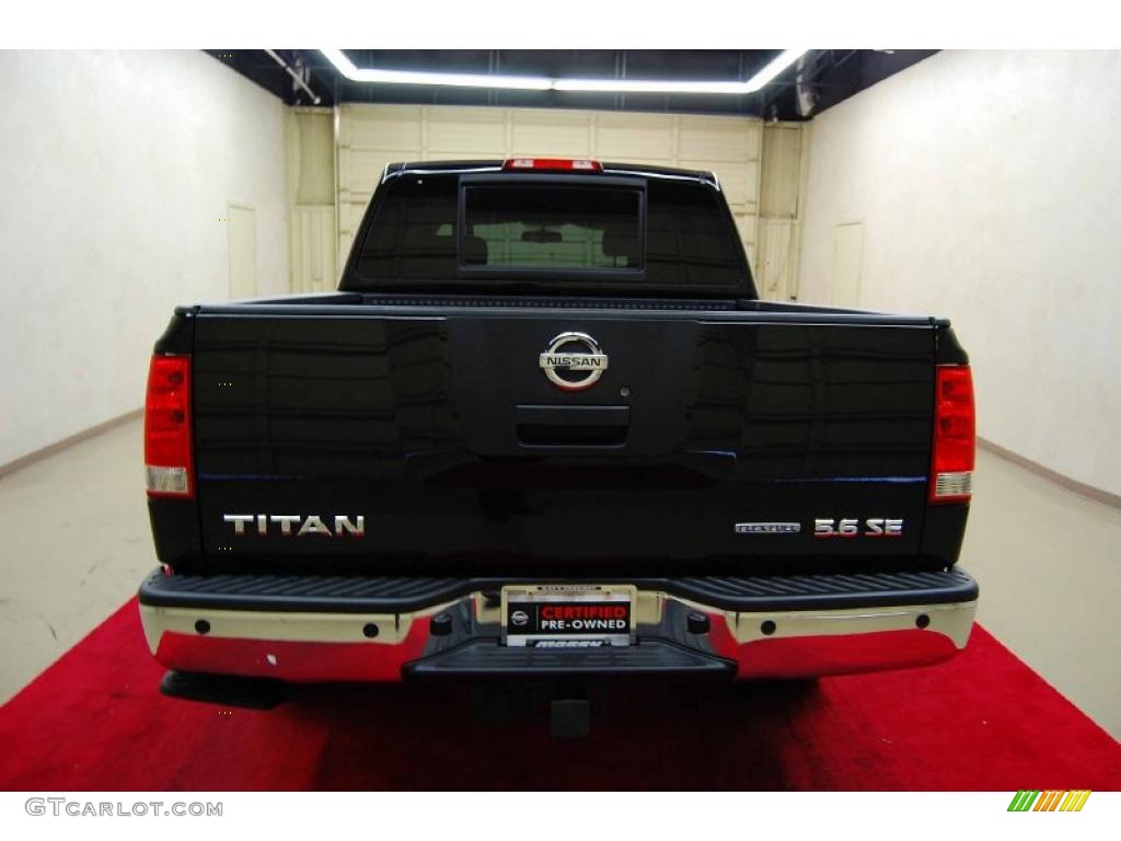 Galaxy Black 2010 Nissan Titan SE Crew Cab Exterior Photo #44910655