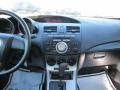 Black 2010 Mazda MAZDA3 i Touring 4 Door Dashboard