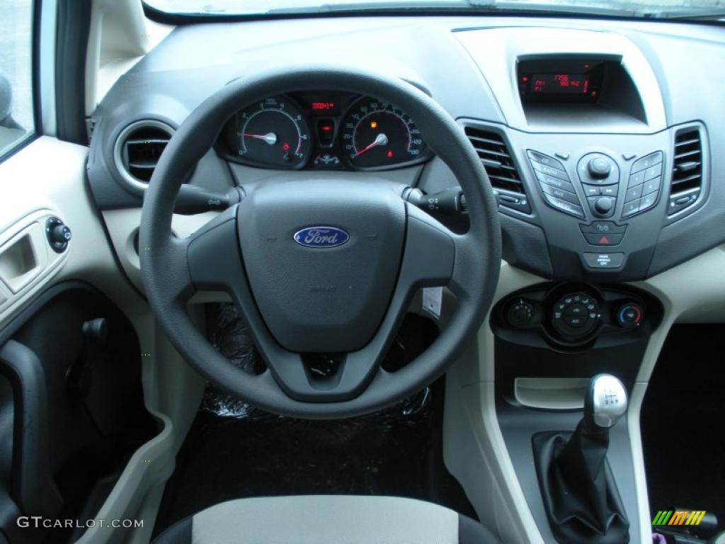 2011 Ford Fiesta S Sedan Light Stone/Charcoal Black Cloth Dashboard Photo #45001606