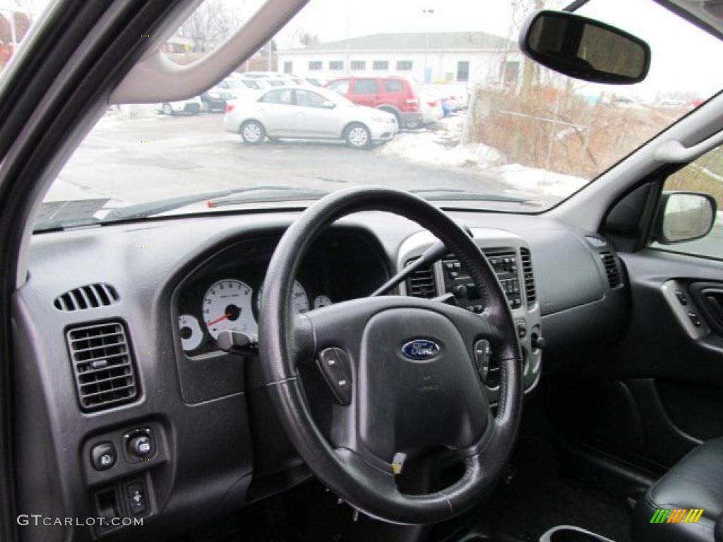 2003 Ford Escape Limited 4WD Ebony Black Dashboard Photo #45018523