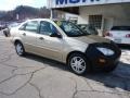 2000 Fort Knox Gold Metallic Ford Focus SE Sedan  photo #2